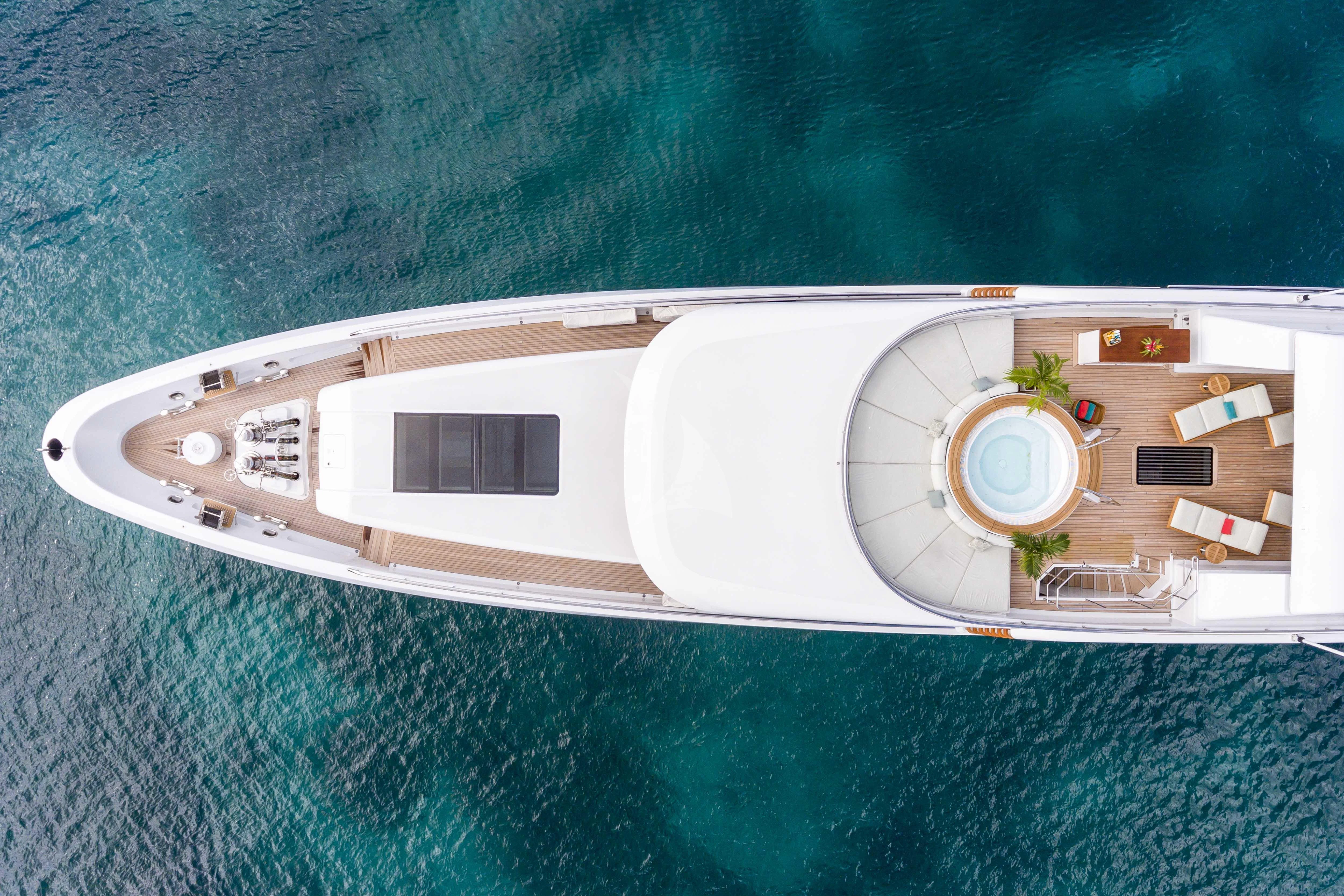 a white building with a round courtyard aboard GLADIATOR Yacht for Sale