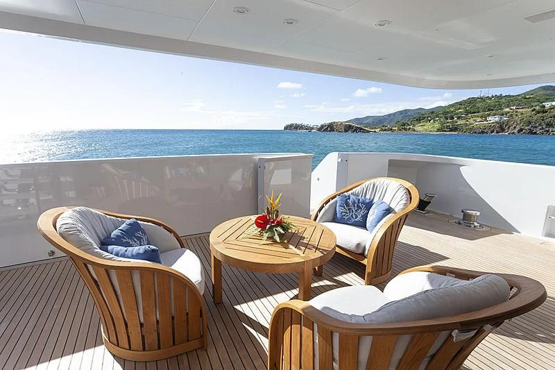a room with chairs and a table aboard GLADIATOR Yacht for Sale