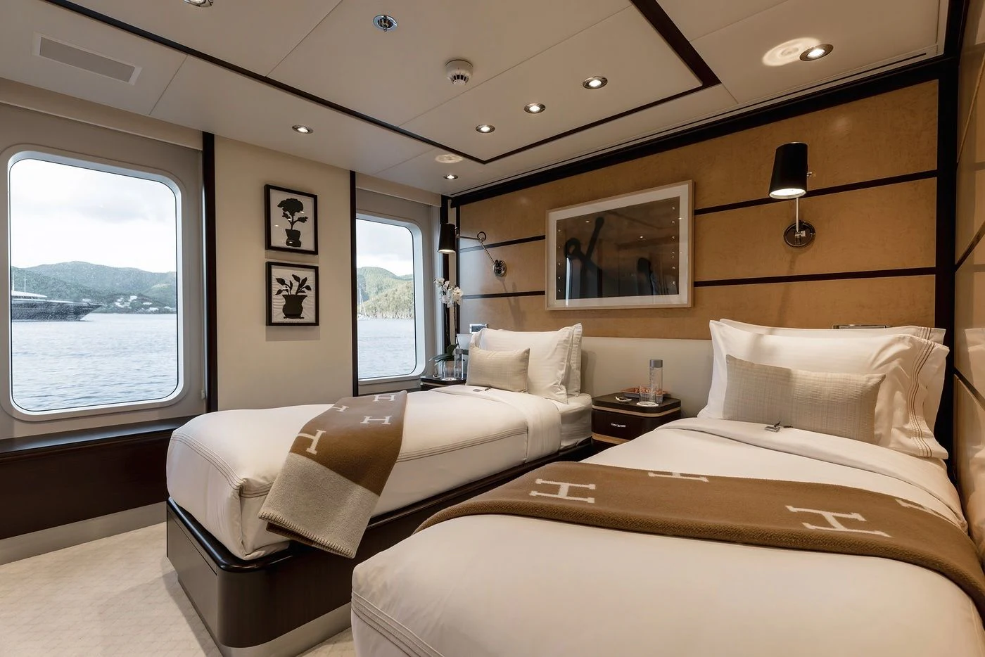 a room with two beds aboard GLADIATOR Yacht for Sale