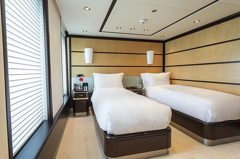 a room with two beds aboard GLADIATOR Yacht for Sale