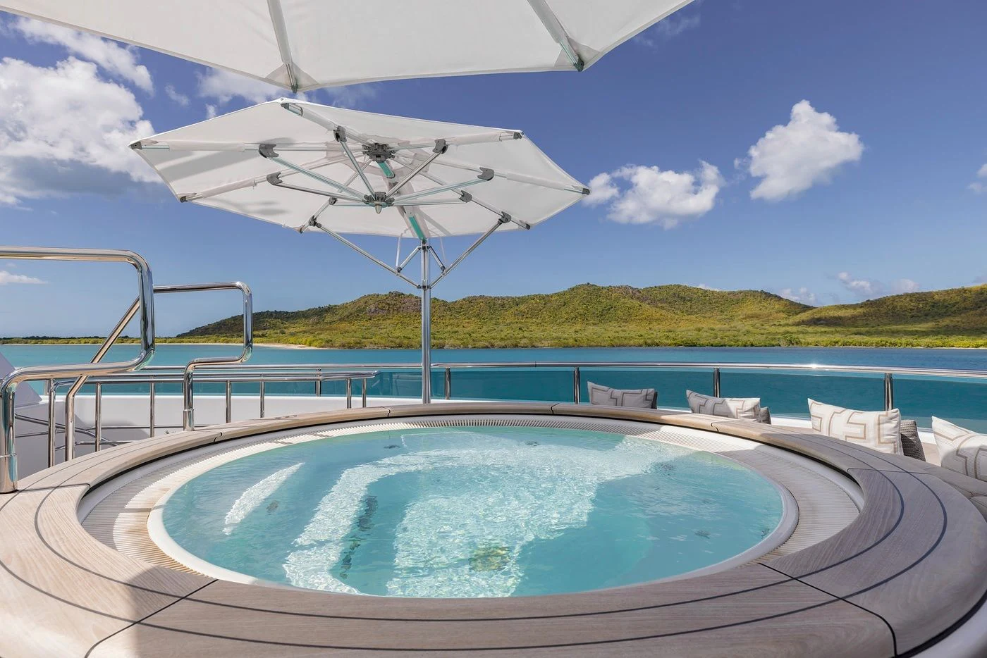 a swimming pool with a satellite dish aboard GLADIATOR Yacht for Sale