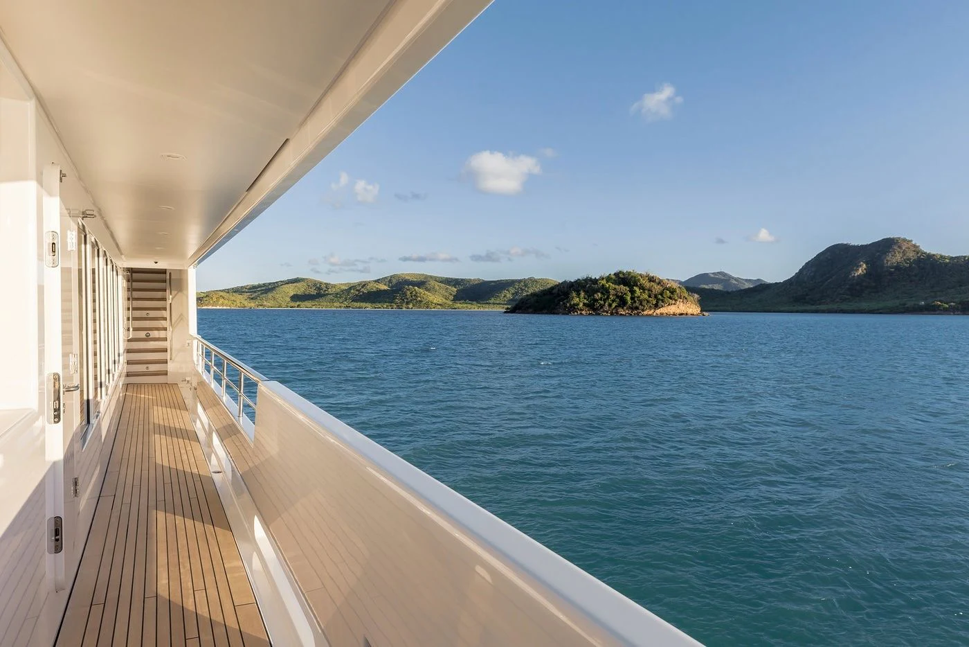 a dock leading to a beach aboard GLADIATOR Yacht for Sale