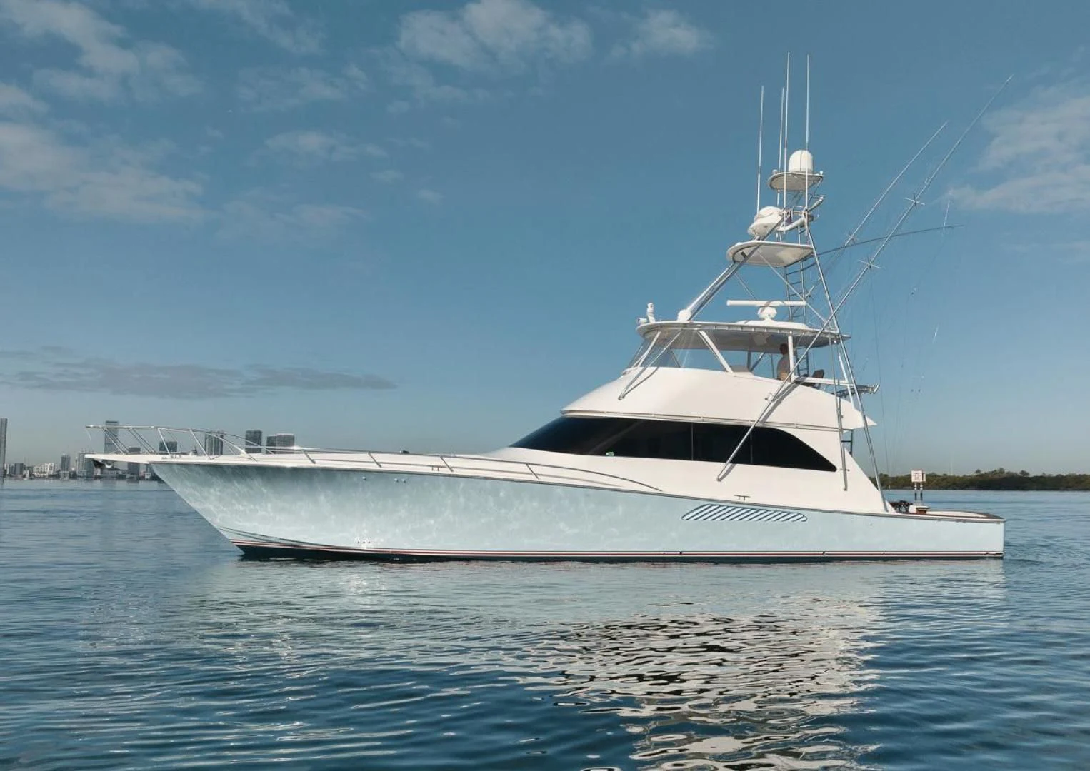 a white boat on the water aboard 68 VIKING Yacht for Sale