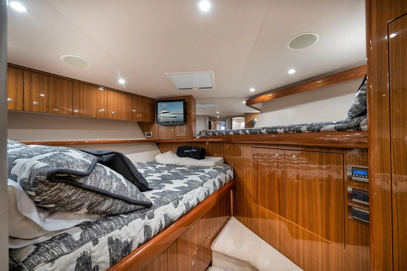 a room with wooden cabinets aboard 68 VIKING Yacht for Sale