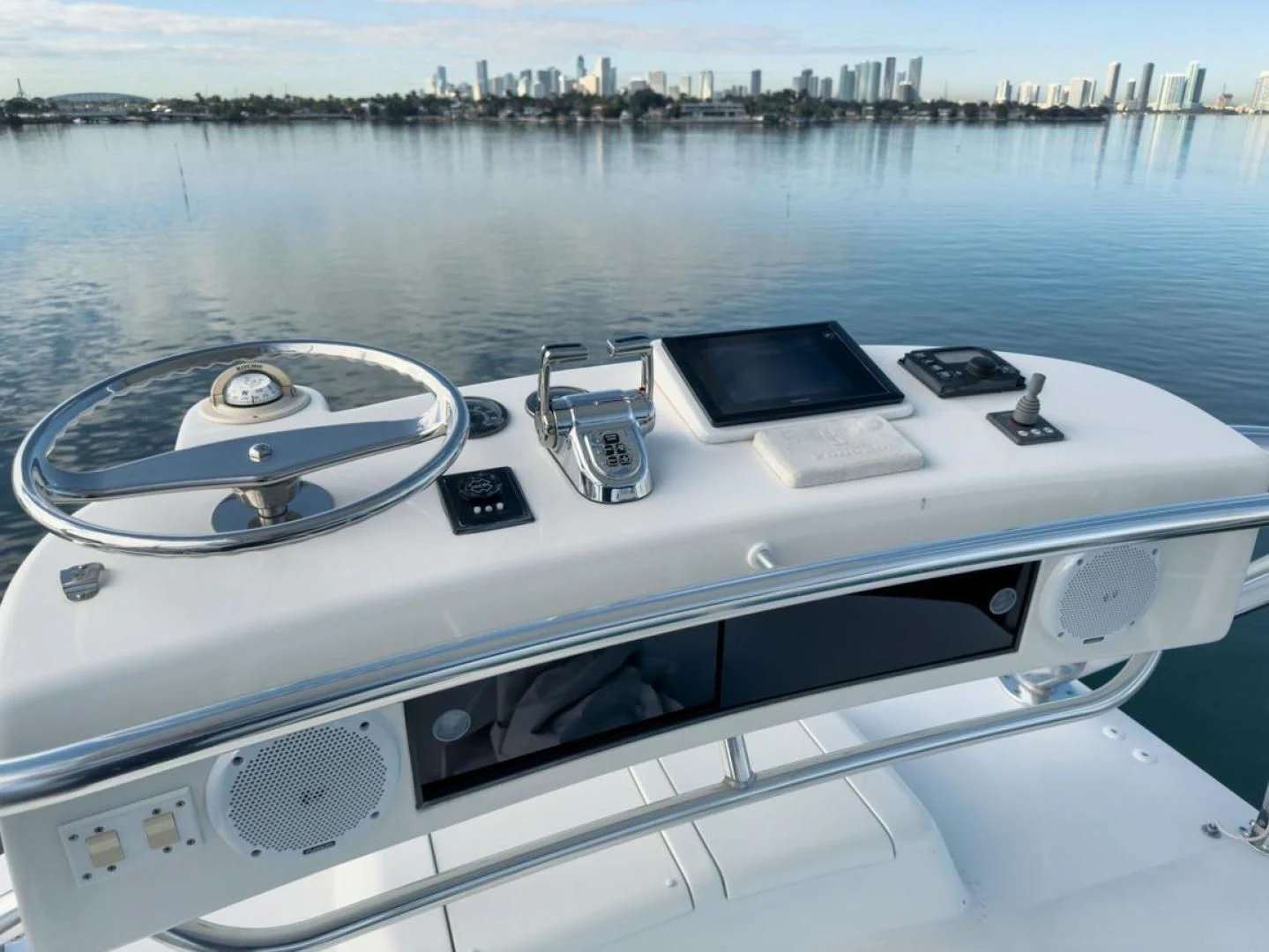 a boat with a view of a city in the background aboard 68 VIKING Yacht for Sale