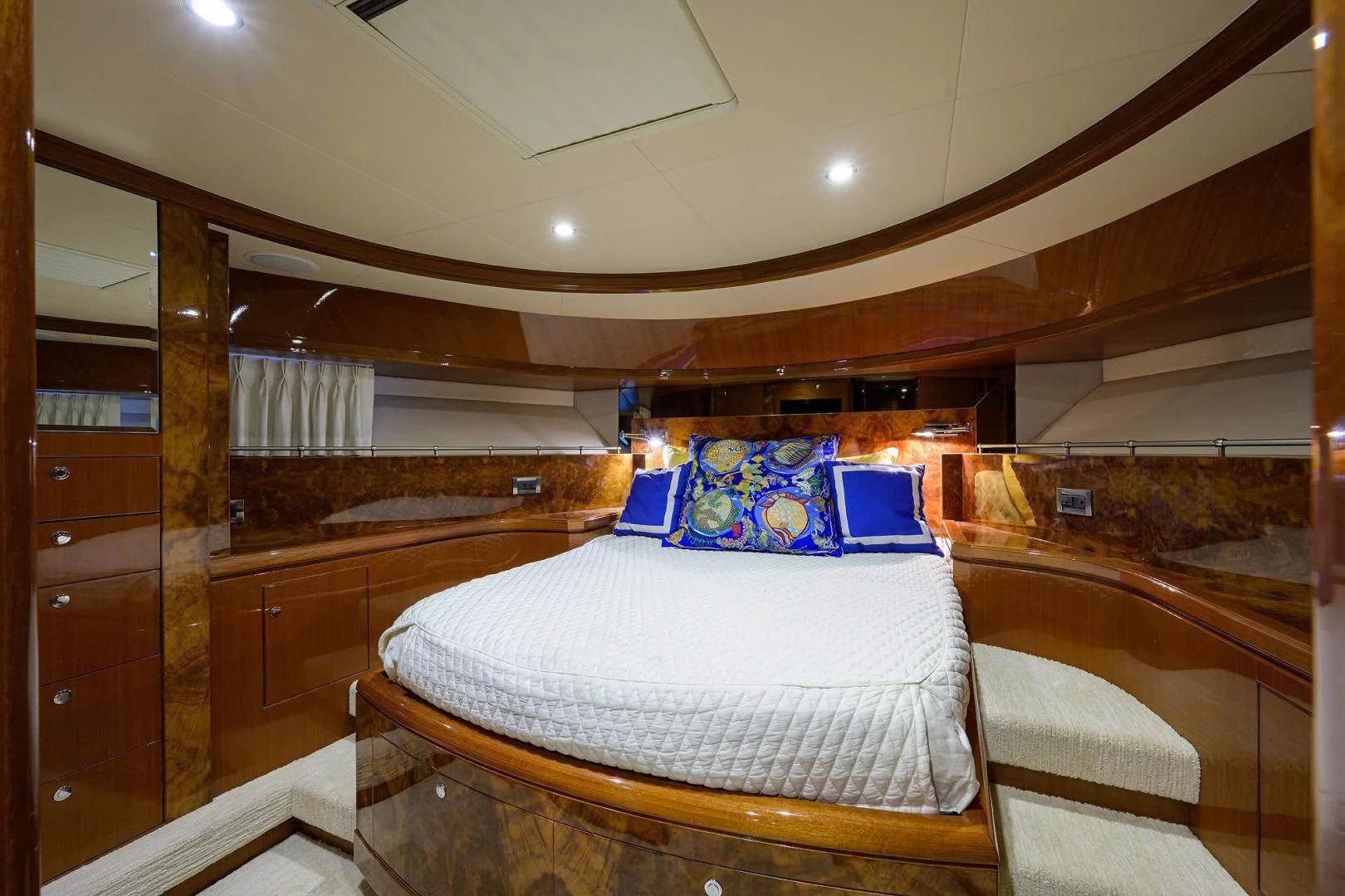 a room with a bed and a mirror aboard BARNSTAR Yacht for Sale
