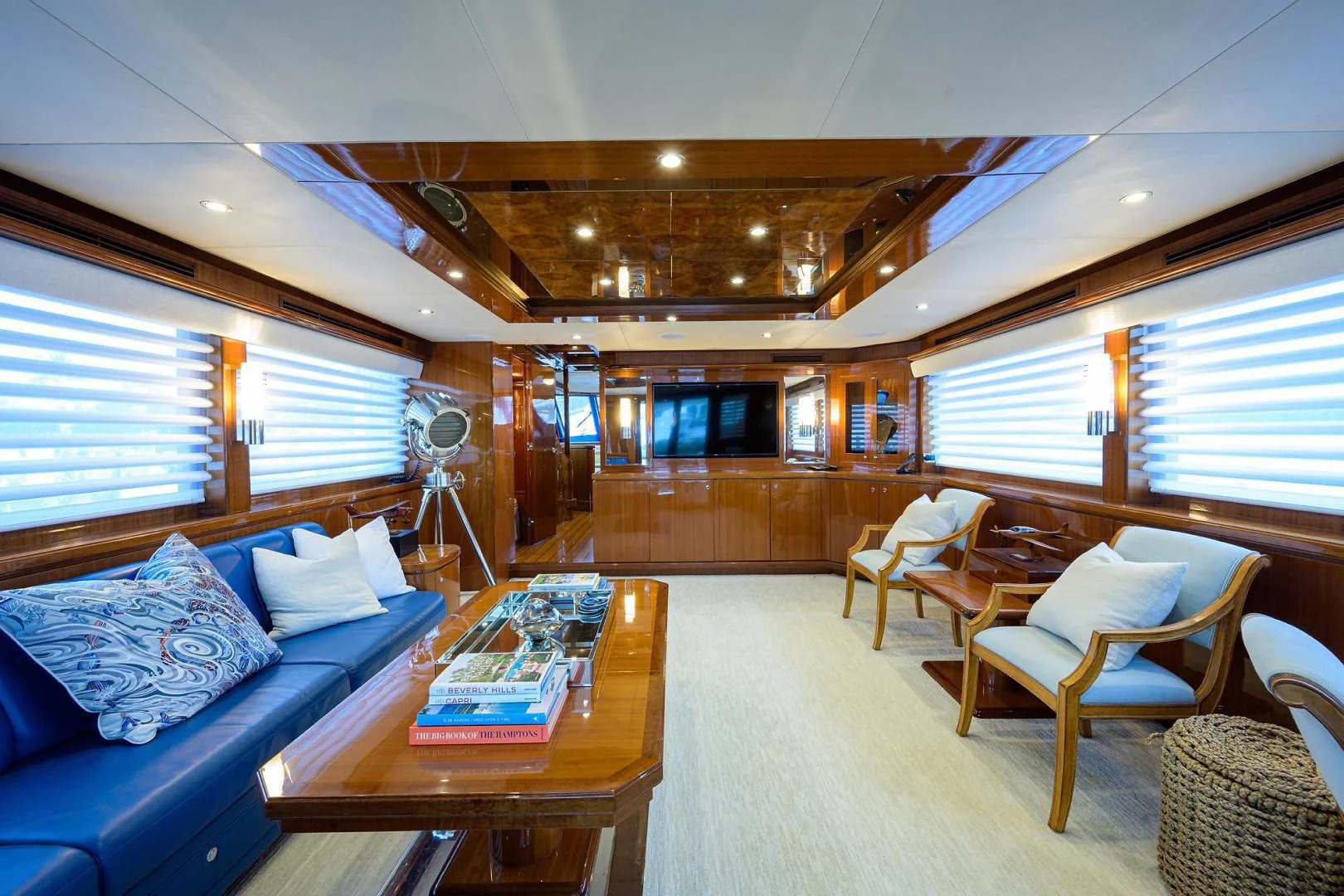 a large living room with a large window aboard BARNSTAR Yacht for Sale