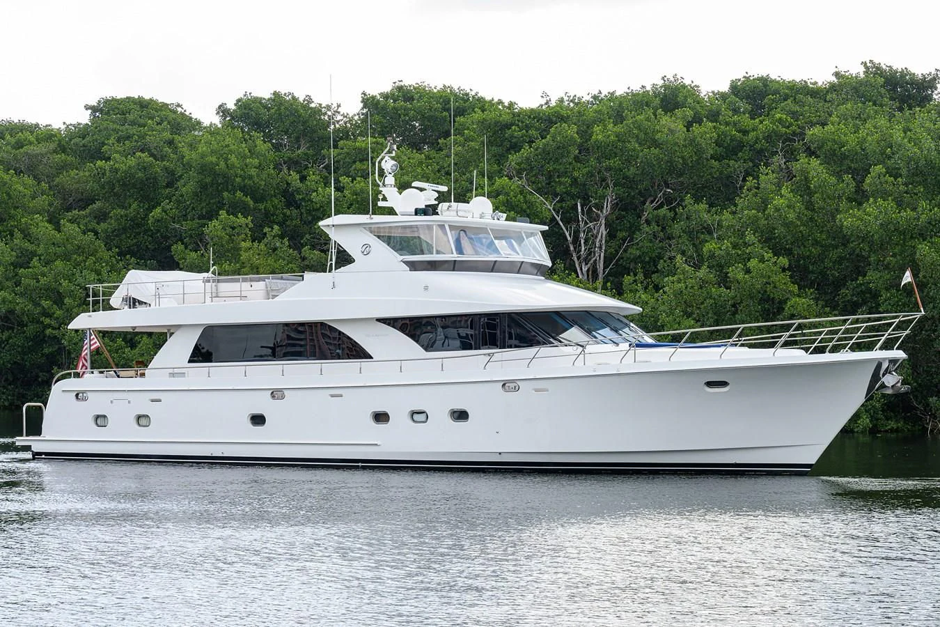 a white yacht on the water aboard BARNSTAR Yacht for Sale
