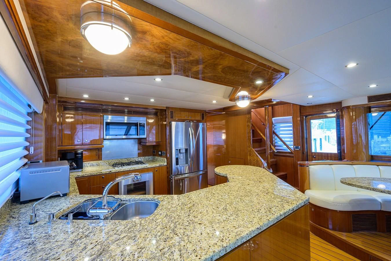 a large kitchen with a large island aboard BARNSTAR Yacht for Sale