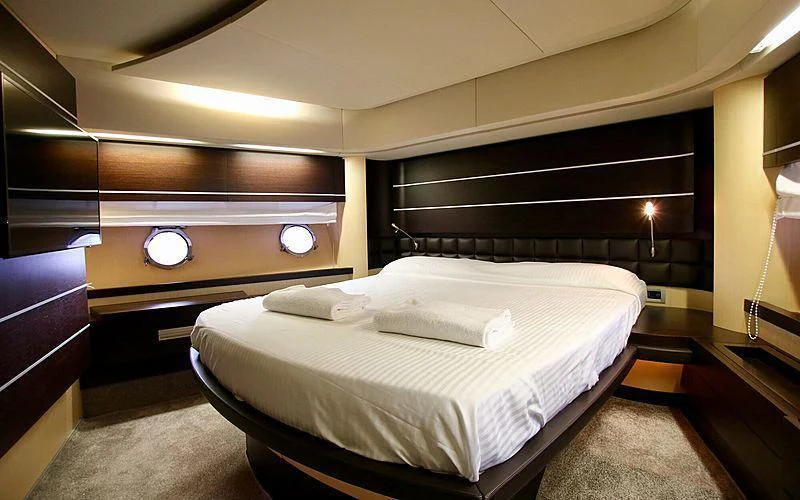 a bed in a room aboard ANCHE NO! Yacht for Sale
