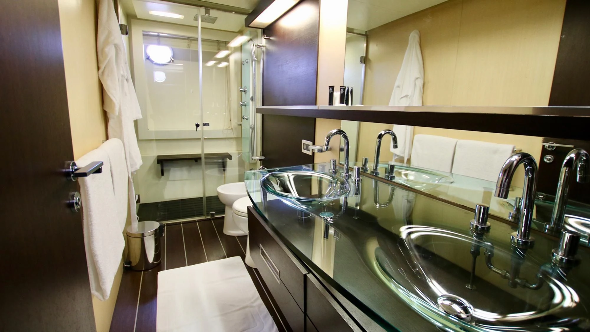a bathroom with a sink and a mirror aboard ANCHE NO! Yacht for Sale