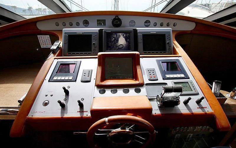 a wooden orange and white machine aboard ANCHE NO! Yacht for Sale