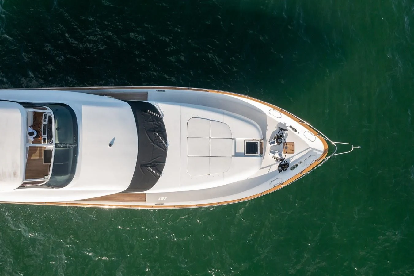 a person standing on a boat aboard DOMINIC Yacht for Sale