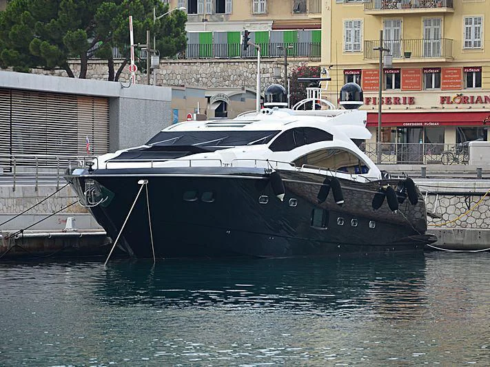a boat is parked on the water aboard FREE WILLI Yacht for Sale