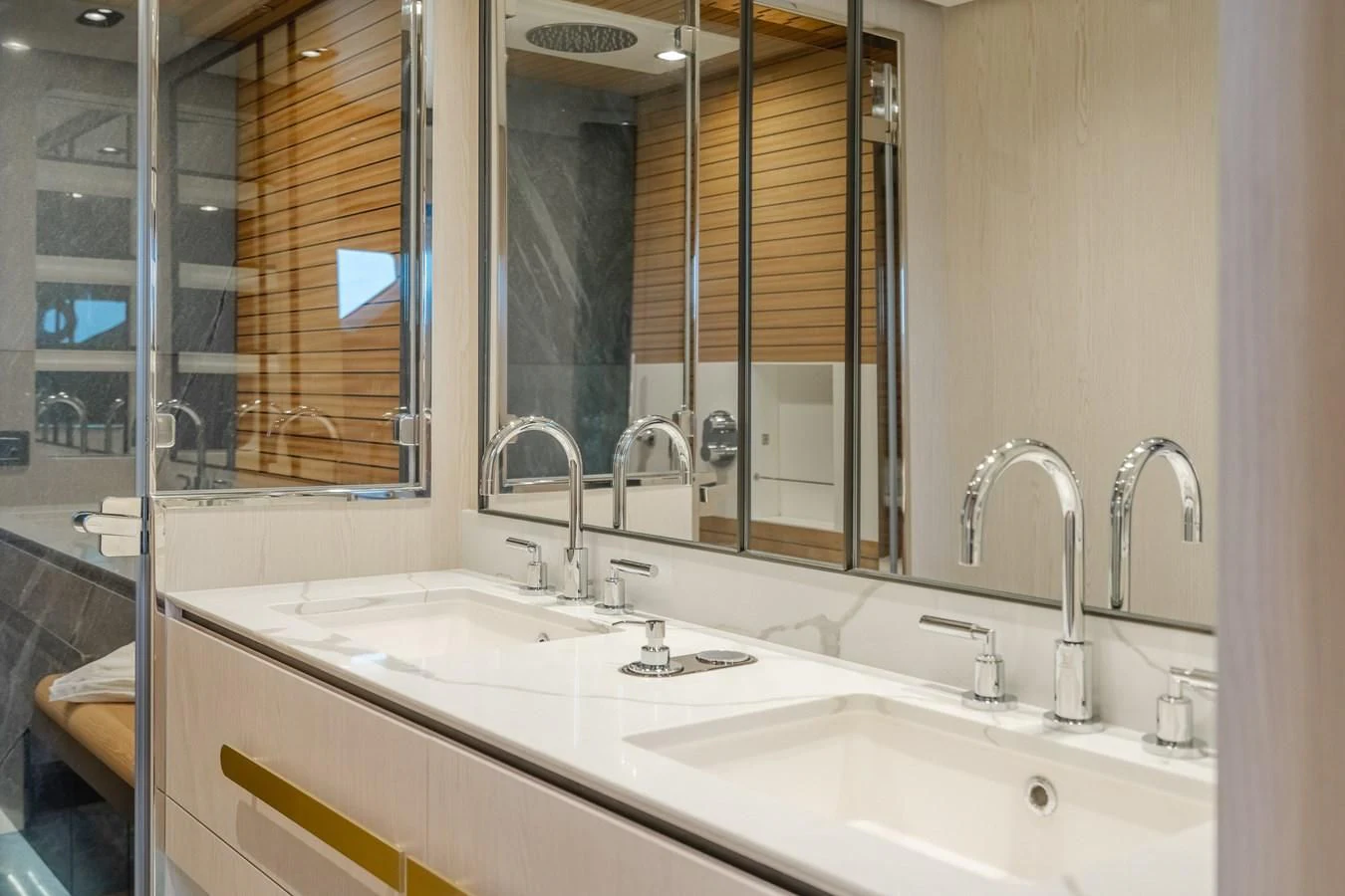 a bathroom with two sinks aboard AZIMUT 25 METRI GRANDE Yacht for Sale