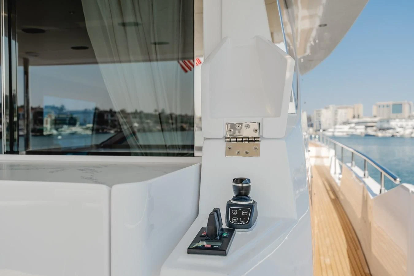 a white machine on a balcony aboard AZIMUT 25 METRI GRANDE Yacht for Sale