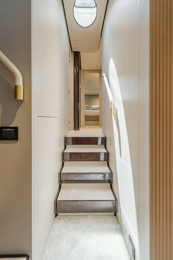 a hallway with a white door aboard AZIMUT 25 METRI GRANDE Yacht for Sale