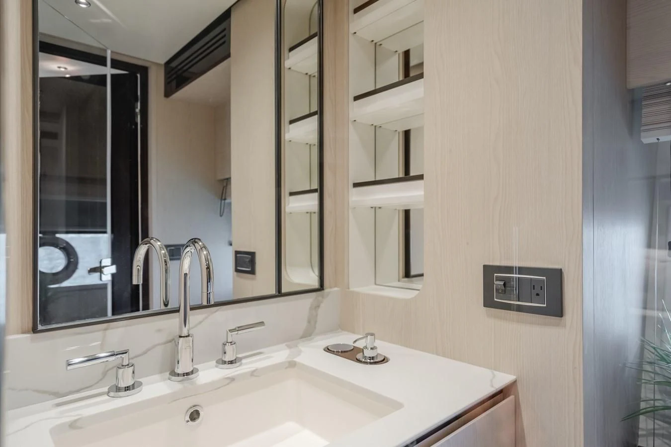 a bathroom with a sink and a mirror aboard AZIMUT 25 METRI GRANDE Yacht for Sale