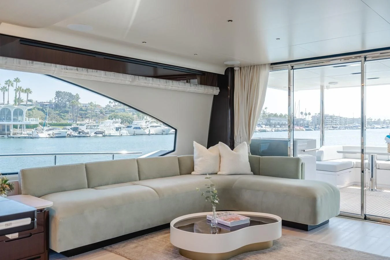 a living room with a large window aboard AZIMUT 25 METRI GRANDE Yacht for Sale