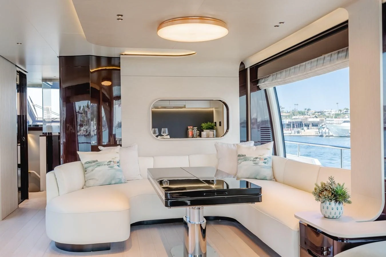 a living room with a large window aboard AZIMUT 25 METRI GRANDE Yacht for Sale