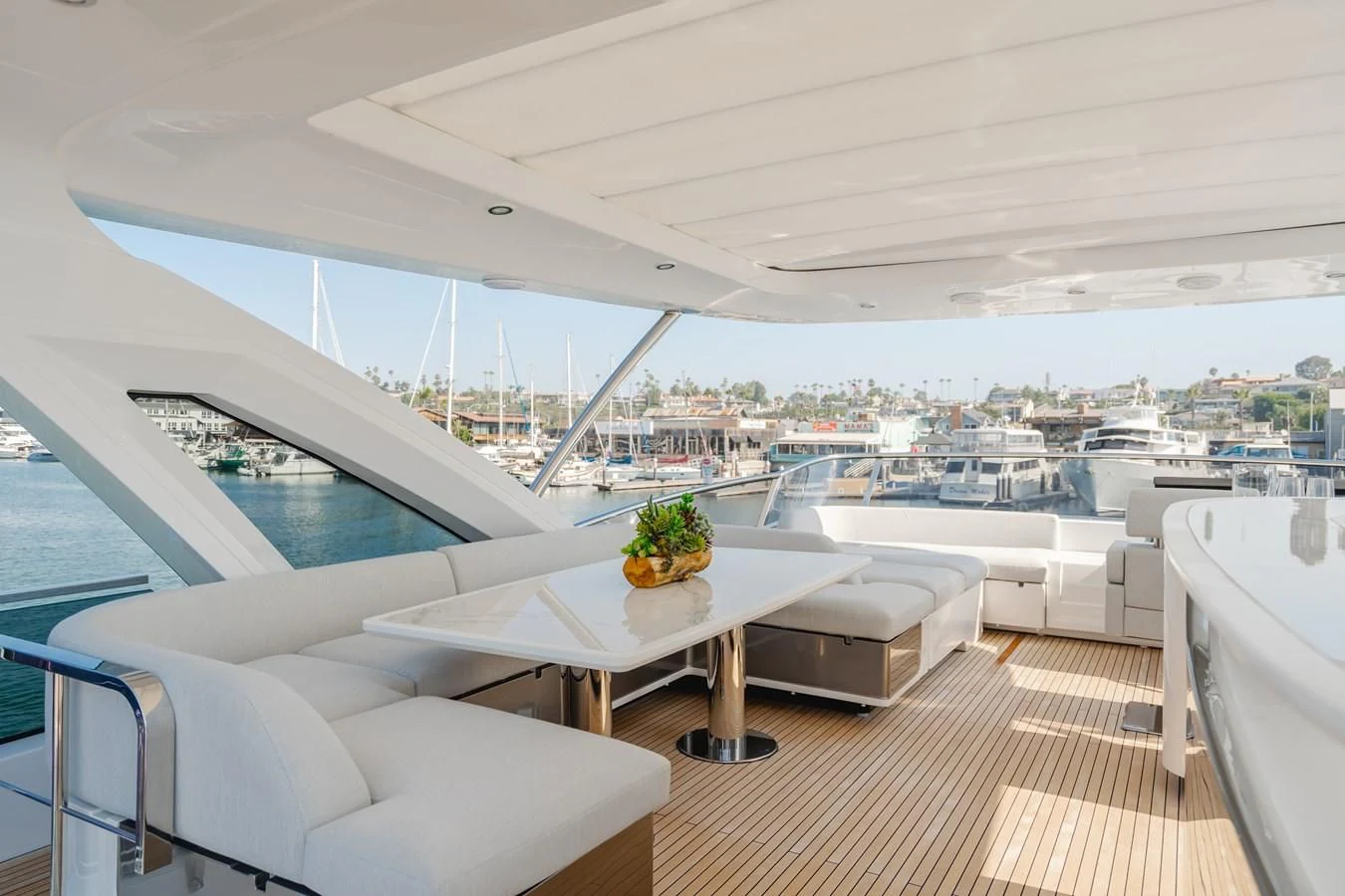 a room with a table and chairs aboard AZIMUT 25 METRI GRANDE Yacht for Sale