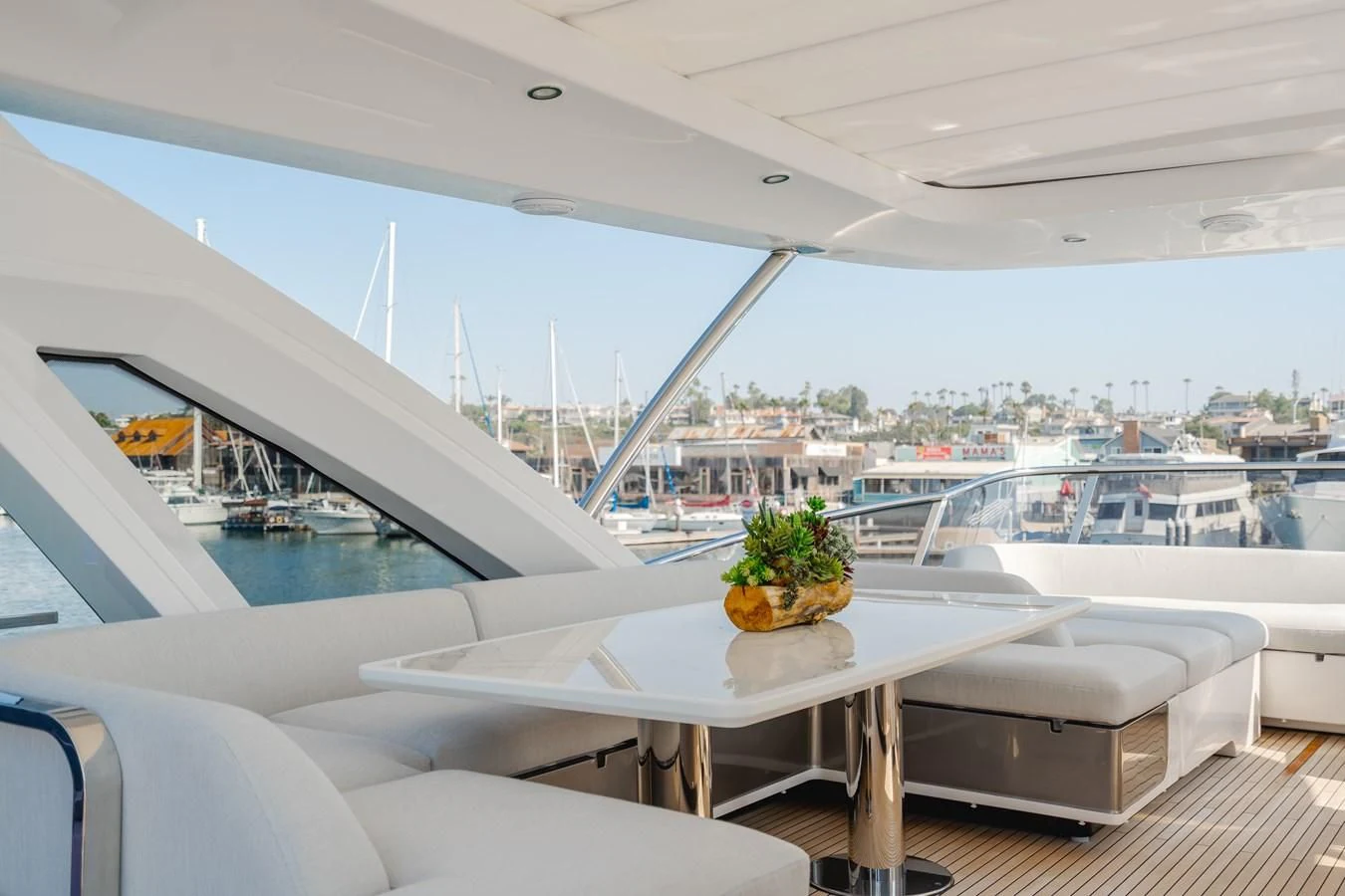 a room with a table and chairs aboard AZIMUT 25 METRI GRANDE Yacht for Sale