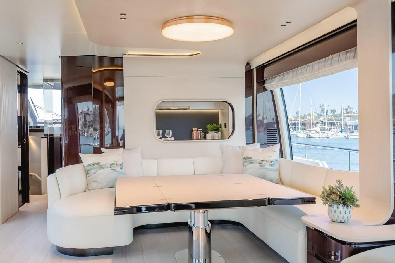 a living room with a large window aboard AZIMUT 25 METRI GRANDE Yacht for Sale