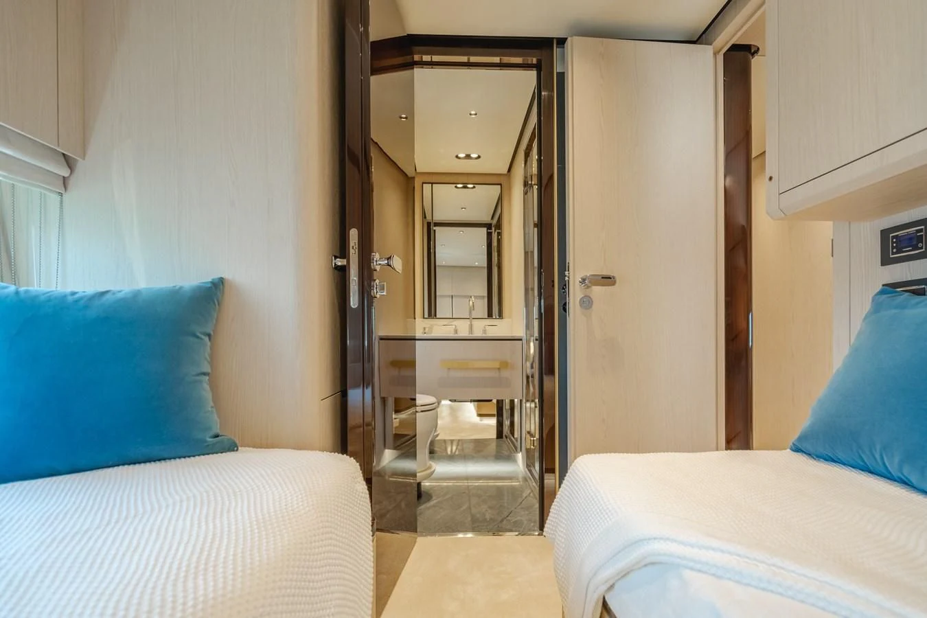 a room with a bed and a mirror aboard AZIMUT 25 METRI GRANDE Yacht for Sale