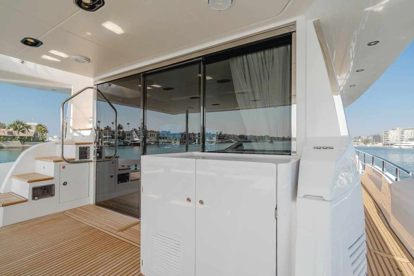 a room with a large glass window aboard AZIMUT 25 METRI GRANDE Yacht for Sale