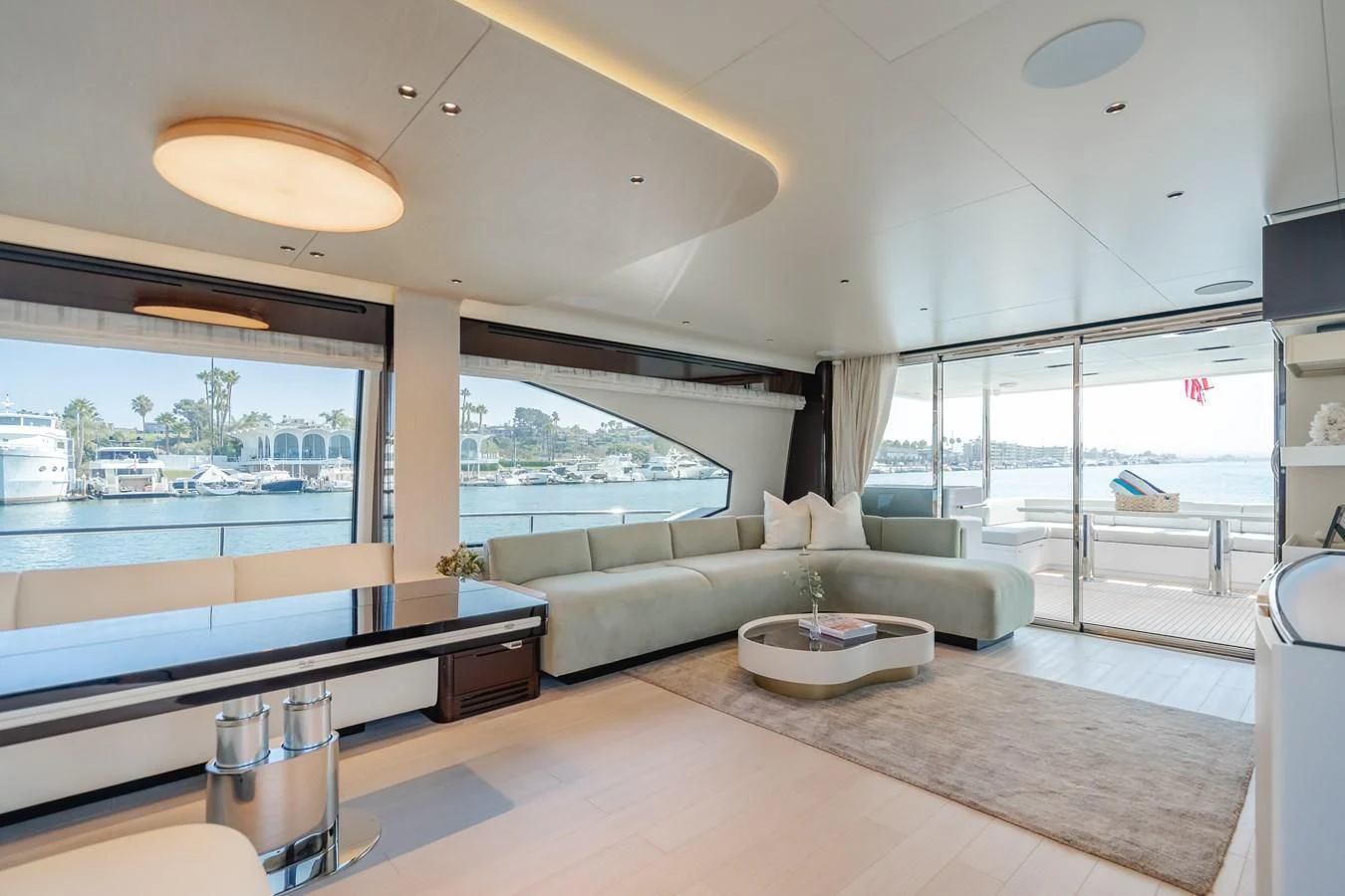 a living room with a large window aboard AZIMUT 25 METRI GRANDE Yacht for Sale