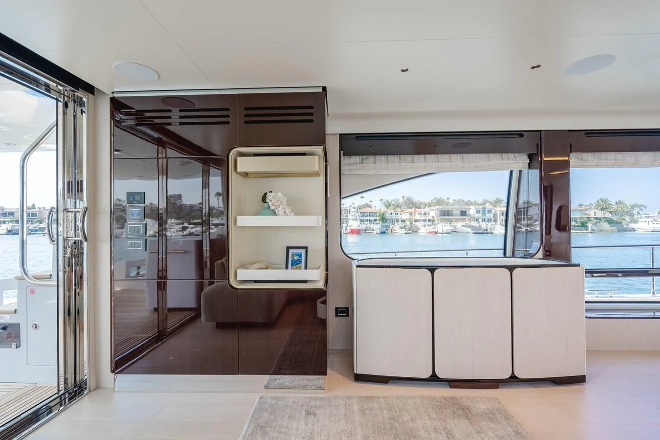 a room with a large glass door aboard AZIMUT 25 METRI GRANDE Yacht for Sale