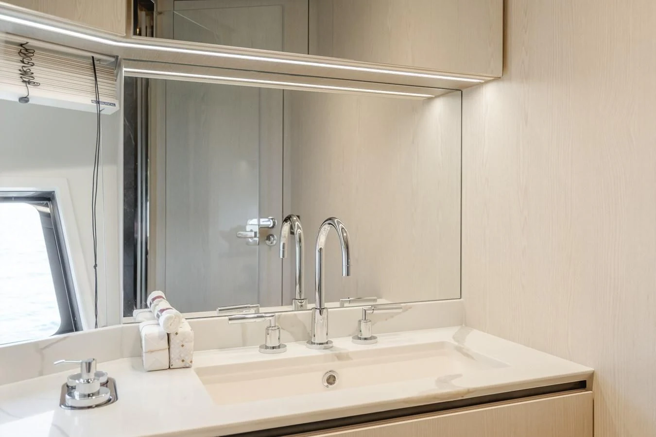 a bathroom with a large mirror aboard AZIMUT 25 METRI GRANDE Yacht for Sale
