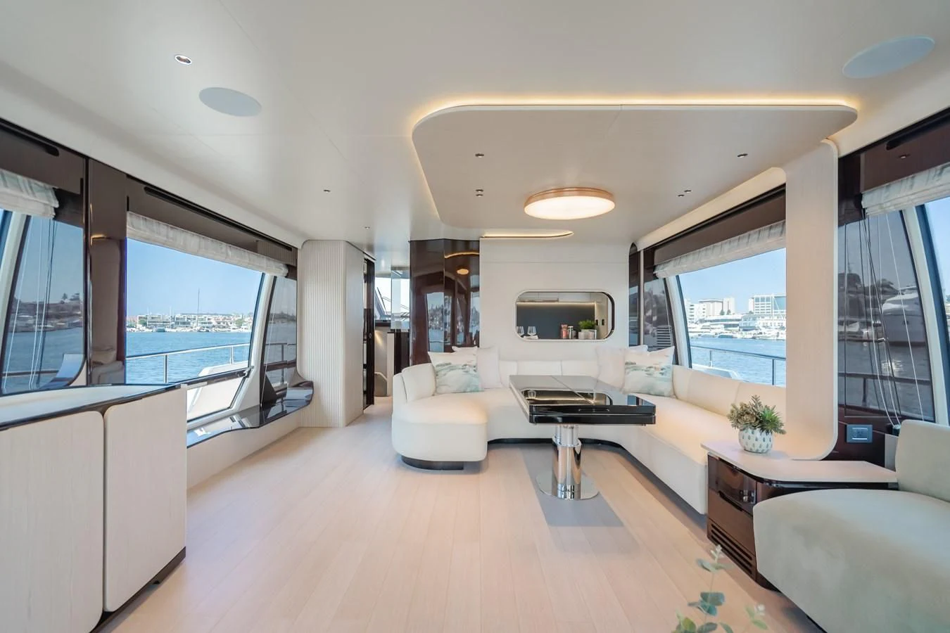 a living room with a large window aboard AZIMUT 25 METRI GRANDE Yacht for Sale