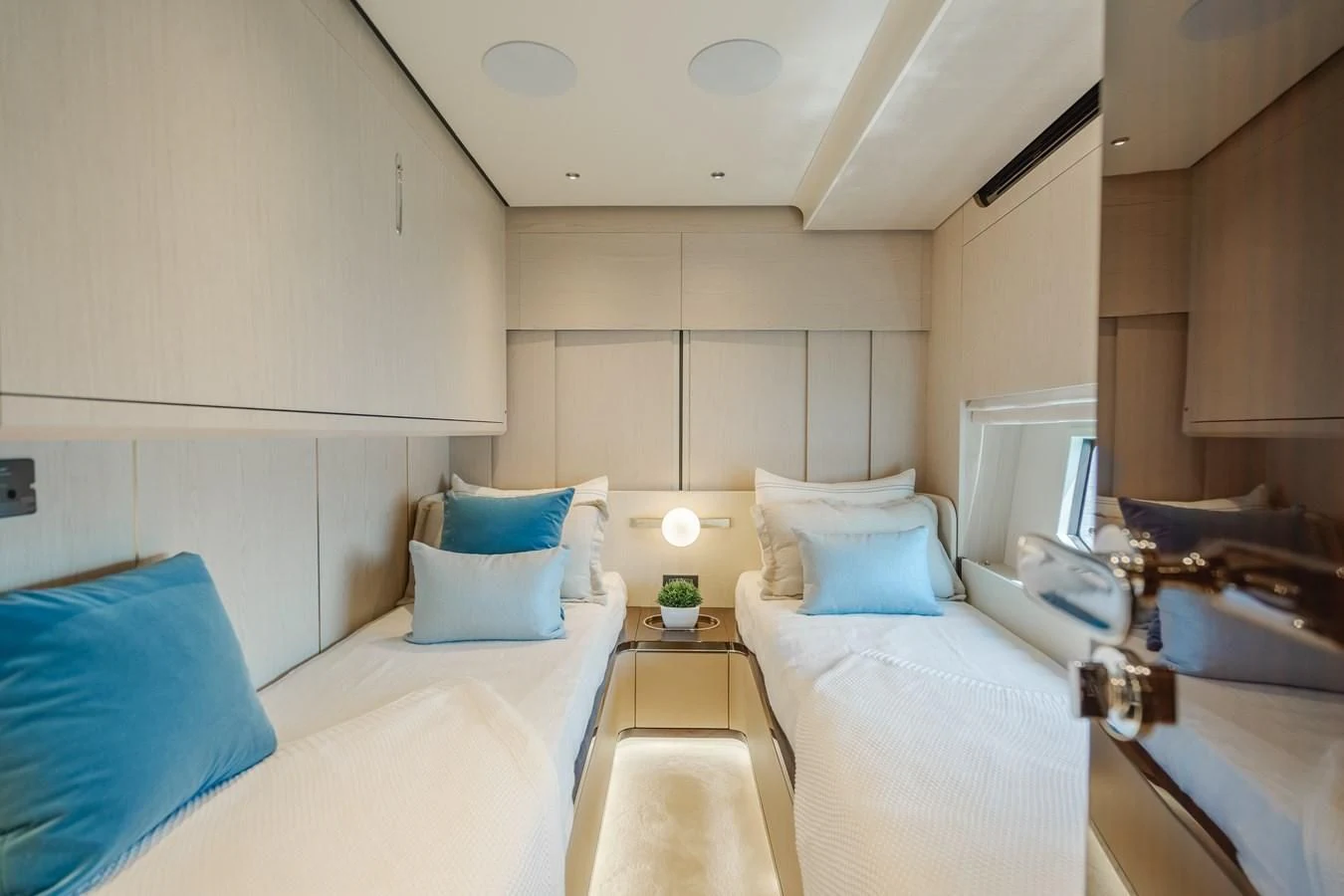 a room with a bed and a desk aboard AZIMUT 25 METRI GRANDE Yacht for Sale