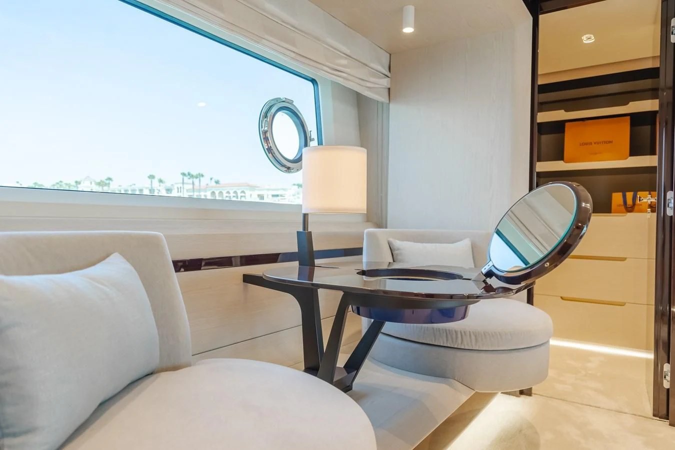 a room with a table and chairs aboard AZIMUT 25 METRI GRANDE Yacht for Sale