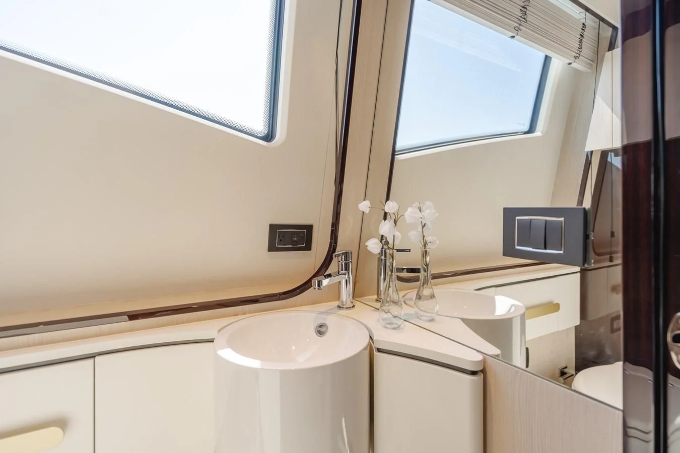 a bathroom with a sink and microwave aboard AZIMUT 25 METRI GRANDE Yacht for Sale