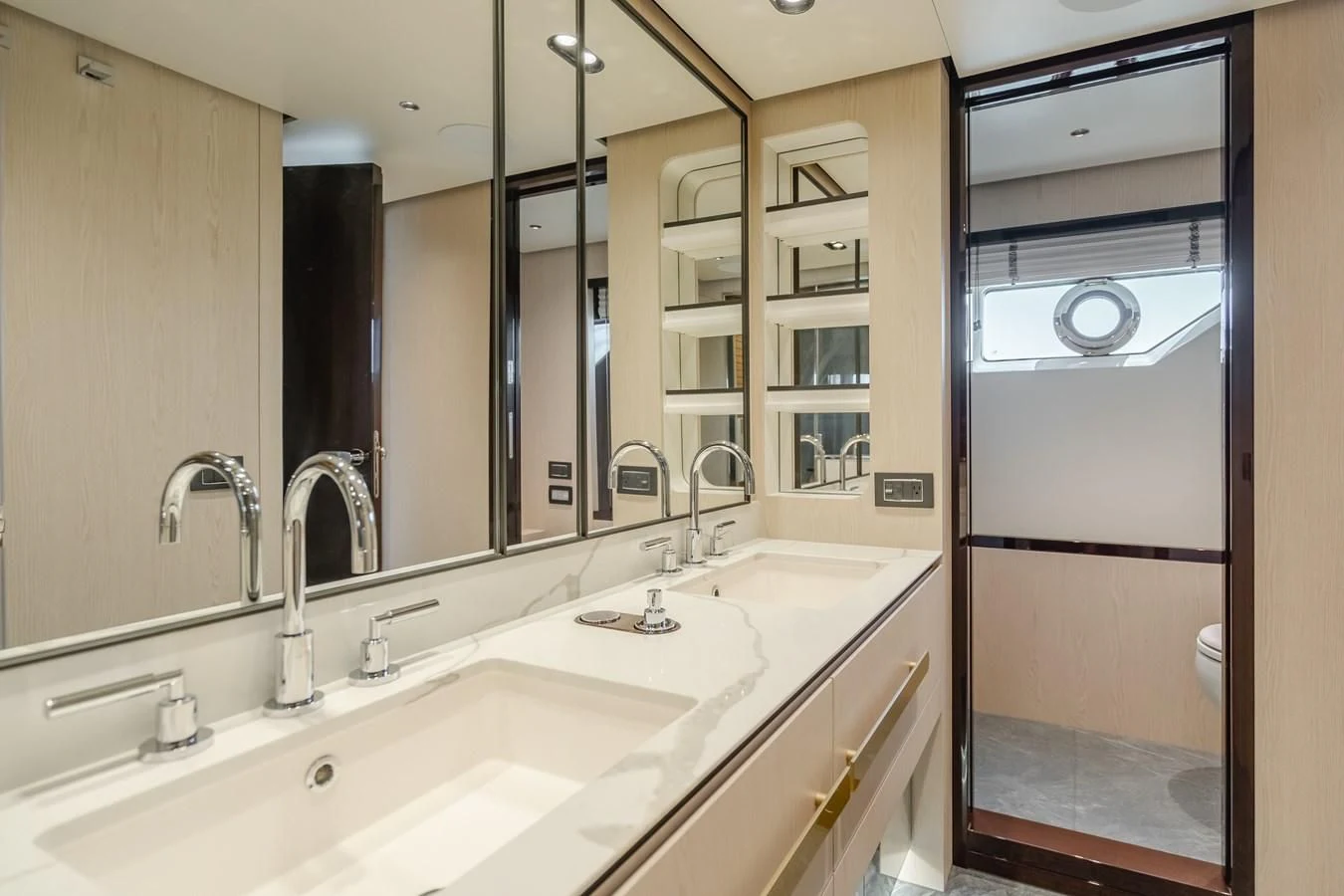 a bathroom with a large mirror aboard AZIMUT 25 METRI GRANDE Yacht for Sale