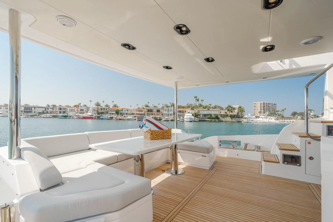 a room with a view of the water and a city aboard AZIMUT 25 METRI GRANDE Yacht for Sale