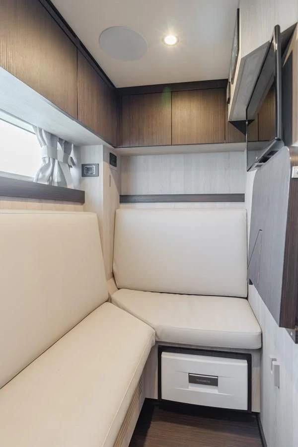 a kitchen with a white counter and cabinets aboard AZIMUT 25 METRI GRANDE Yacht for Sale
