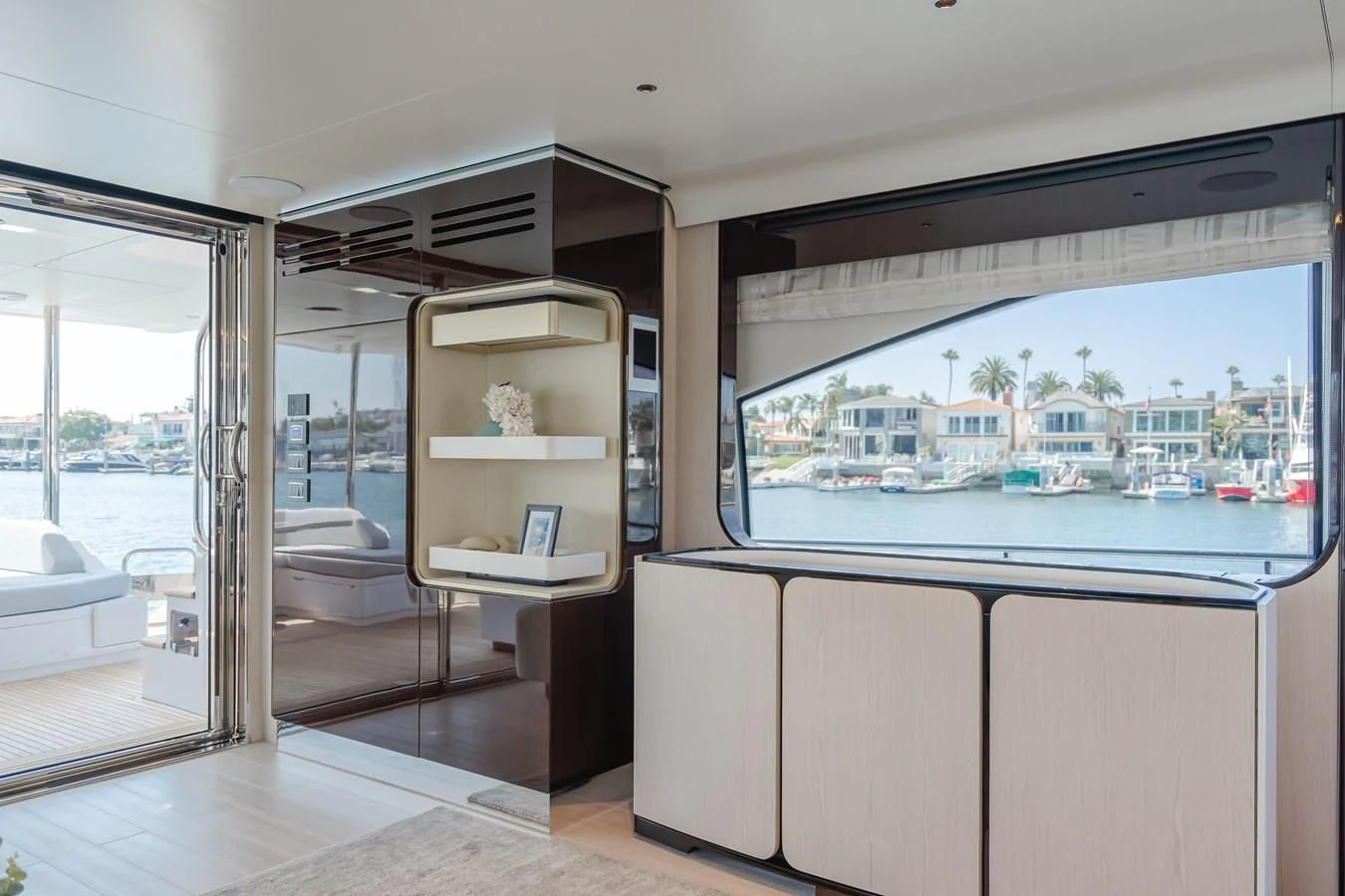 a room with a large window and a view of a city aboard AZIMUT 25 METRI GRANDE Yacht for Sale