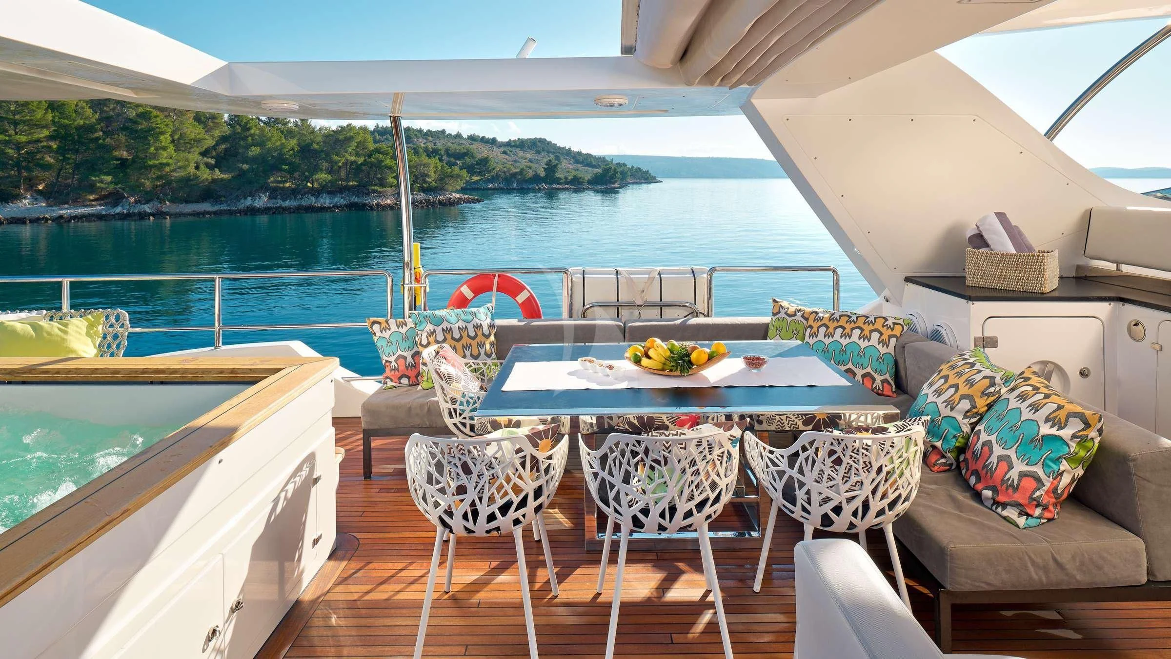 a table and chairs on a deck aboard OCEAN DRIVE Yacht for Charter