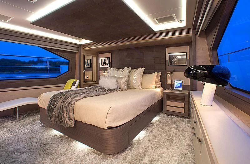 a bedroom with a large bed aboard OCEAN DRIVE Yacht for Charter