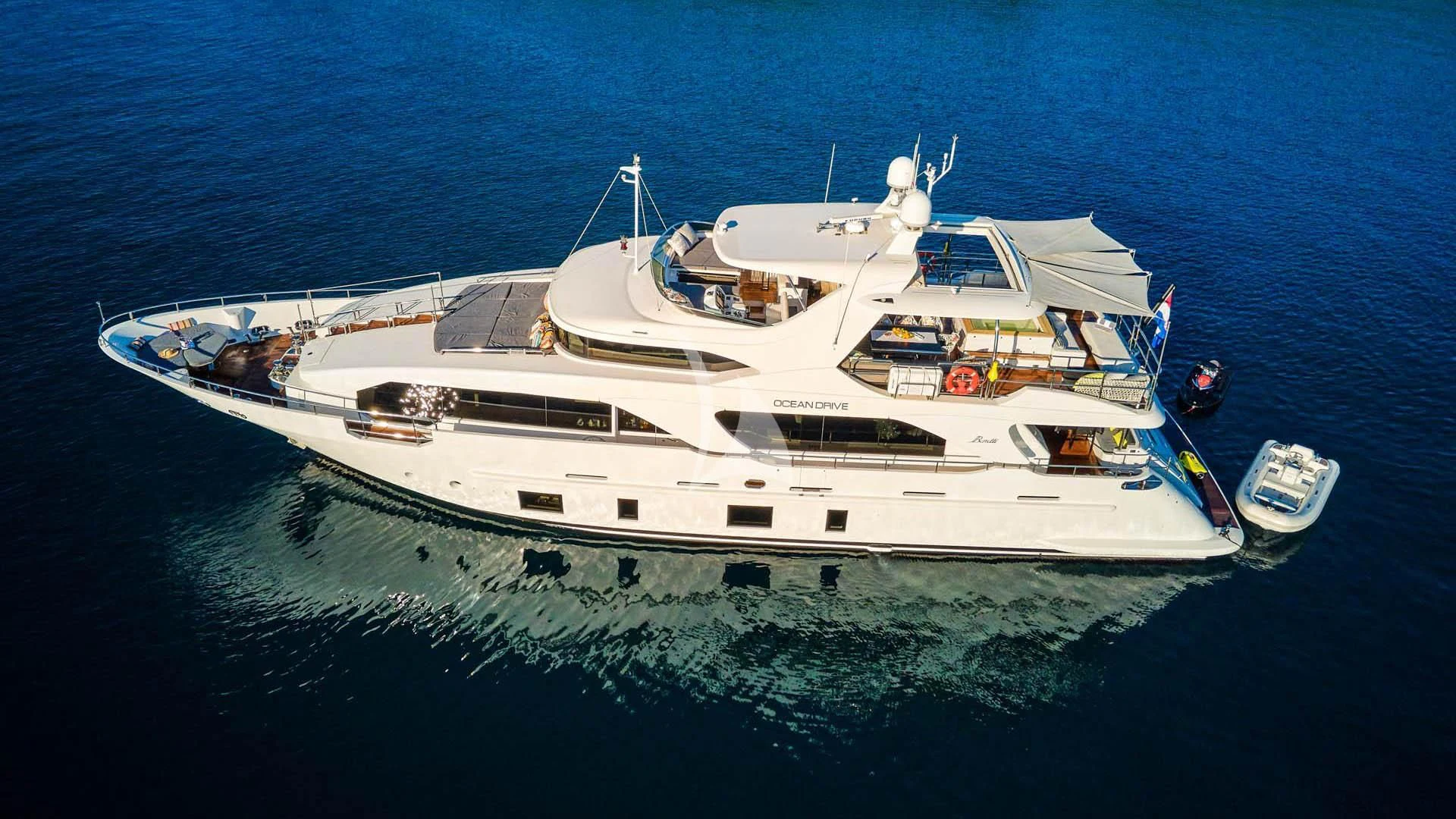 a white yacht in the ocean aboard OCEAN DRIVE Yacht for Charter