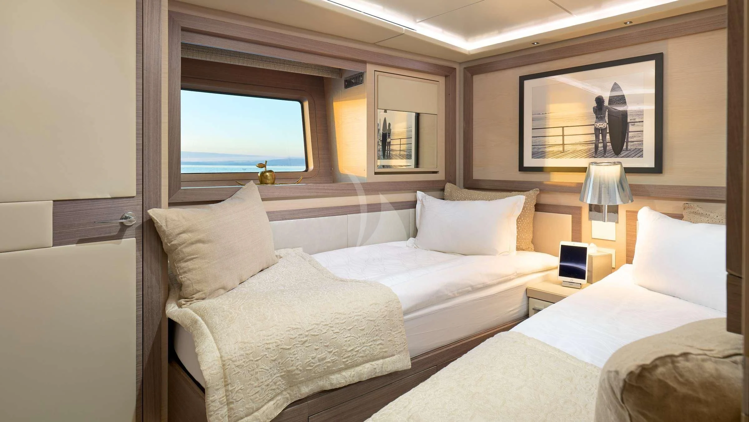 a couple of beds in a room aboard OCEAN DRIVE Yacht for Charter