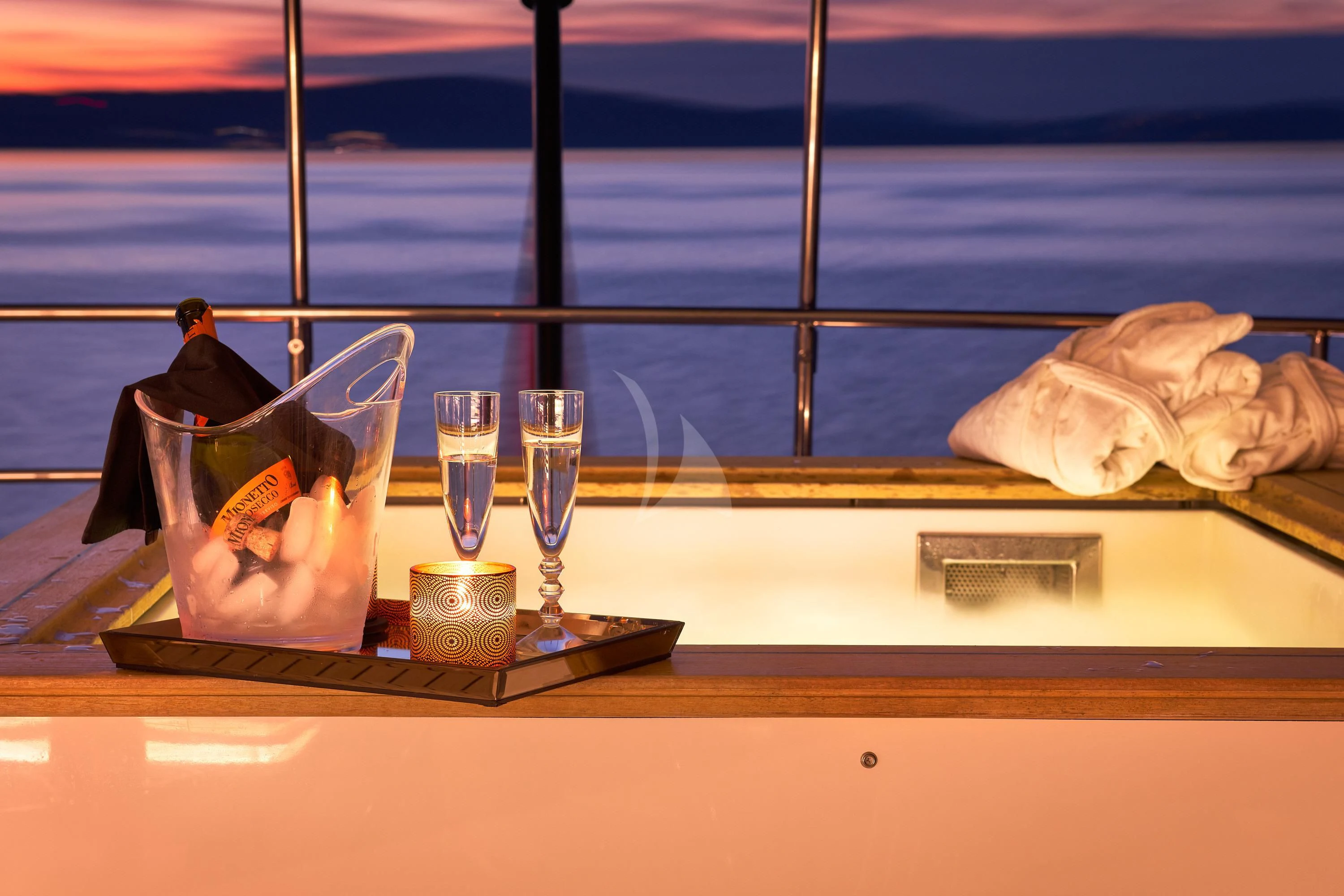 a group of glasses on a table aboard OCEAN DRIVE Yacht for Charter