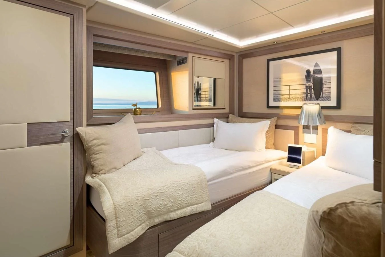 a couple of beds in a hotel room aboard OCEAN DRIVE Yacht for Charter