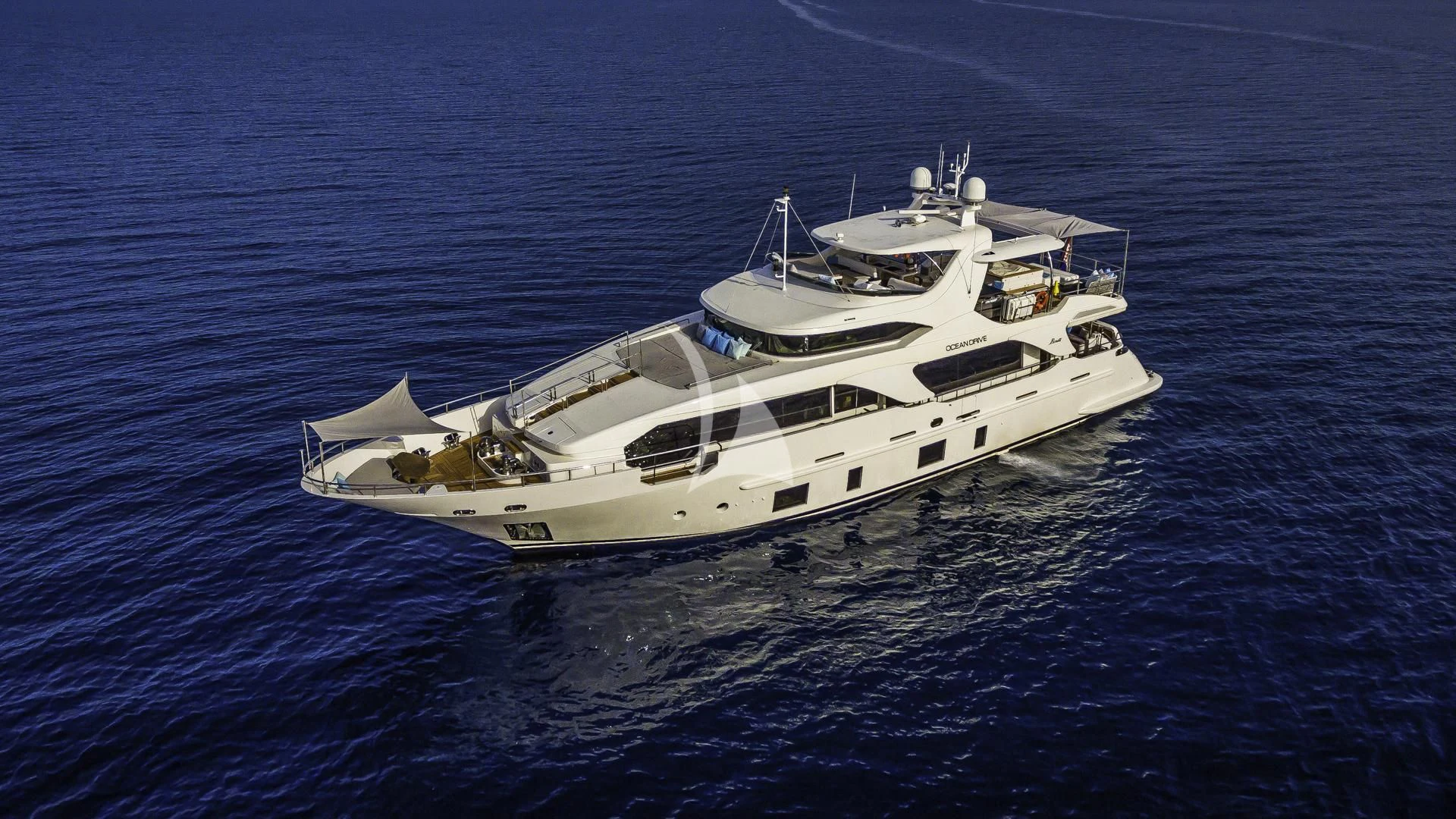 a white yacht in the water aboard OCEAN DRIVE Yacht for Charter