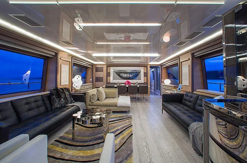 a living room with a large screen aboard OCEAN DRIVE Yacht for Charter