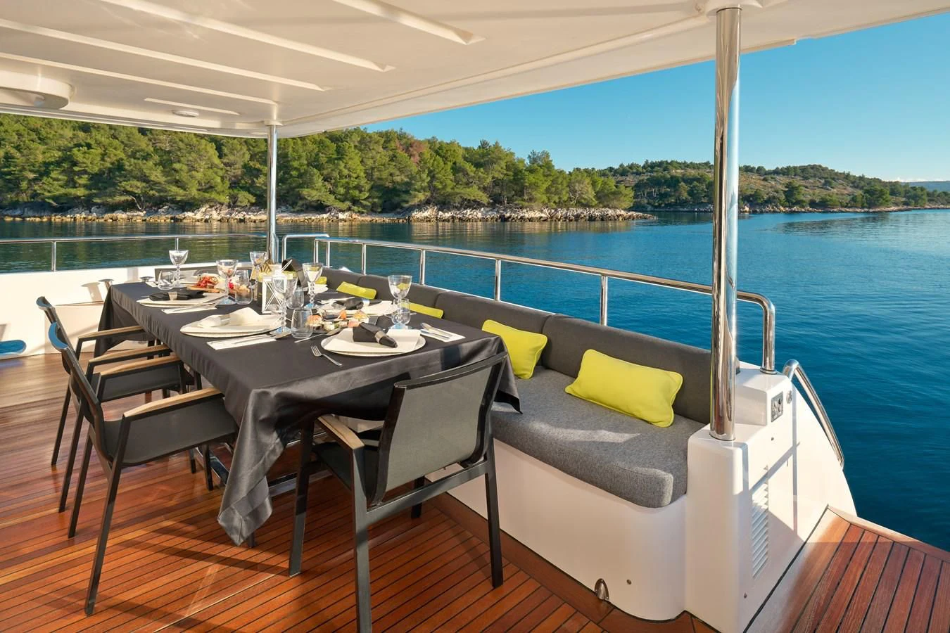 a table with chairs around it aboard OCEAN DRIVE Yacht for Charter