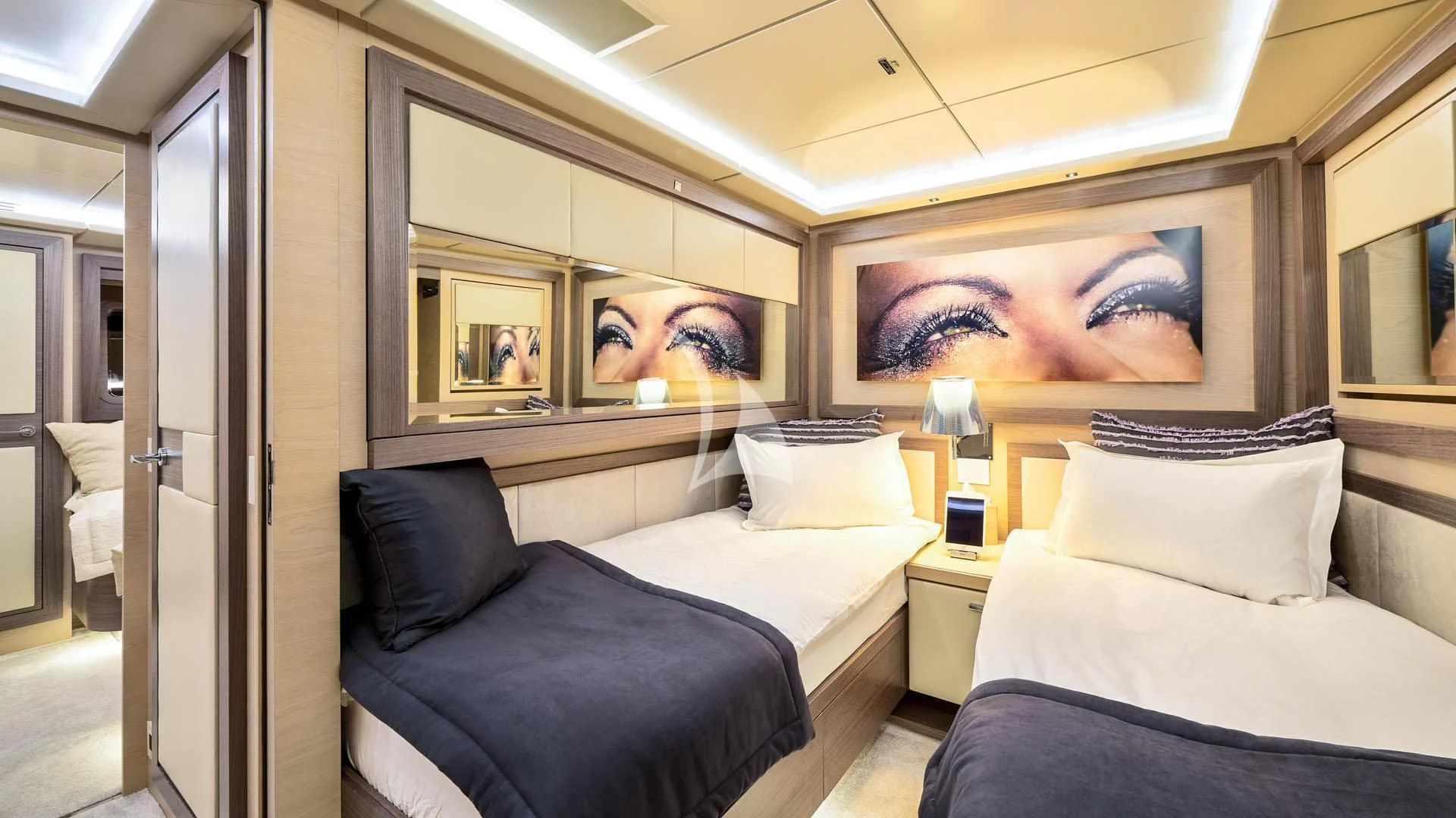 a person taking a selfie in a hotel room aboard OCEAN DRIVE Yacht for Charter